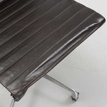 An EA 118 swivel office chair by  Charles and Ray Eames for Herman Miller, designed 1958.