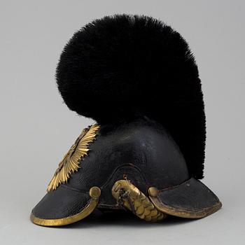 A Swedish Royal Artillery 
officer helmet and epaulets, model 1848 and model 1827-45.