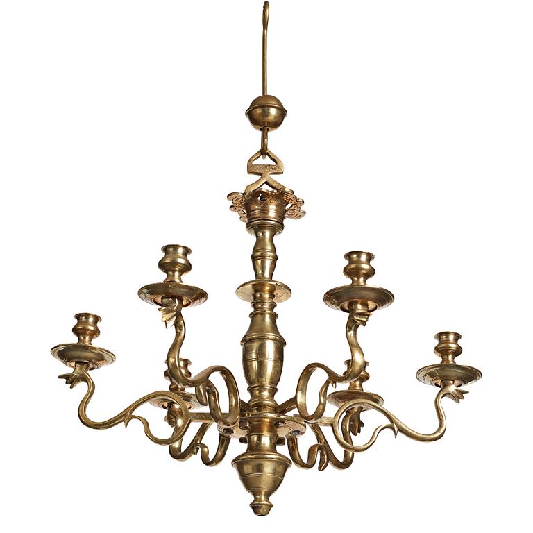 A six-light 18/19th century brass chandelier.