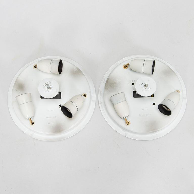 A pair of mid-20th century 'EA 72 ceiling lights for Itsu.