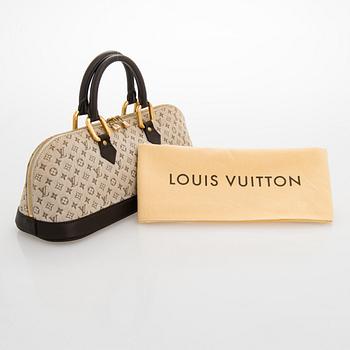 Louis Vuitton, a 'Monogram Mini Lin Alma Long Handbag'.