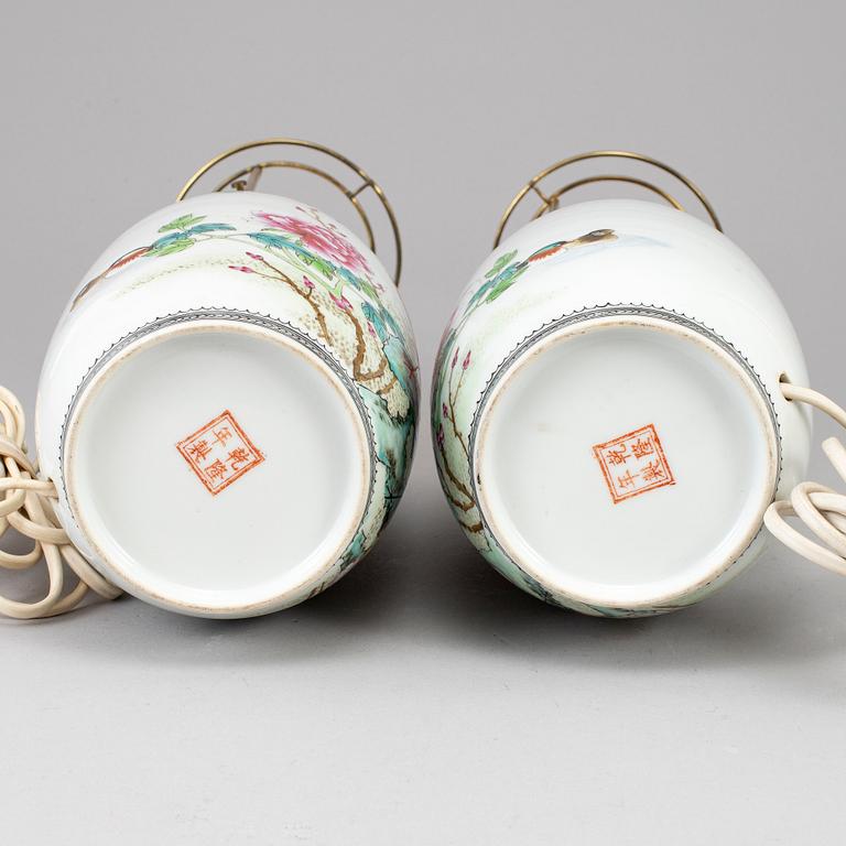 A pair of Chinese famille rose vases, turned into table lamps, 20th century.