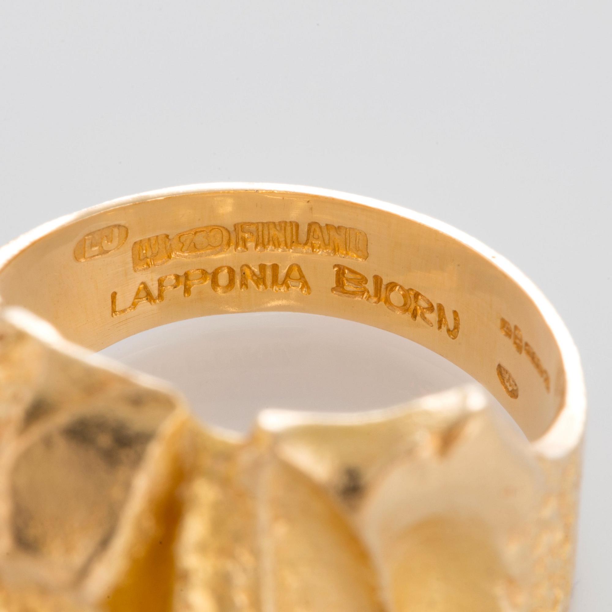 Björn Weckström ring "Tourmaline Bridge" 18K guld med en grön turmalin.