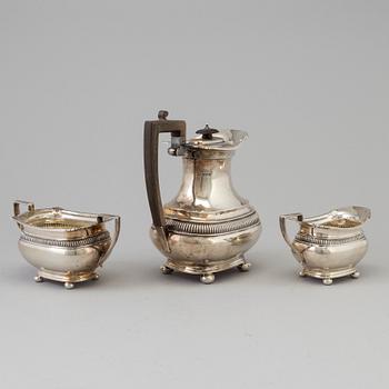 A three piece silver coffee set by The Alex Clark Company, London, first half of the 20th century.