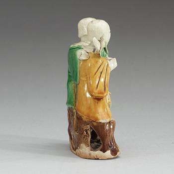 A figure of 'laughing boys', Qing dynasty, 18th Century.