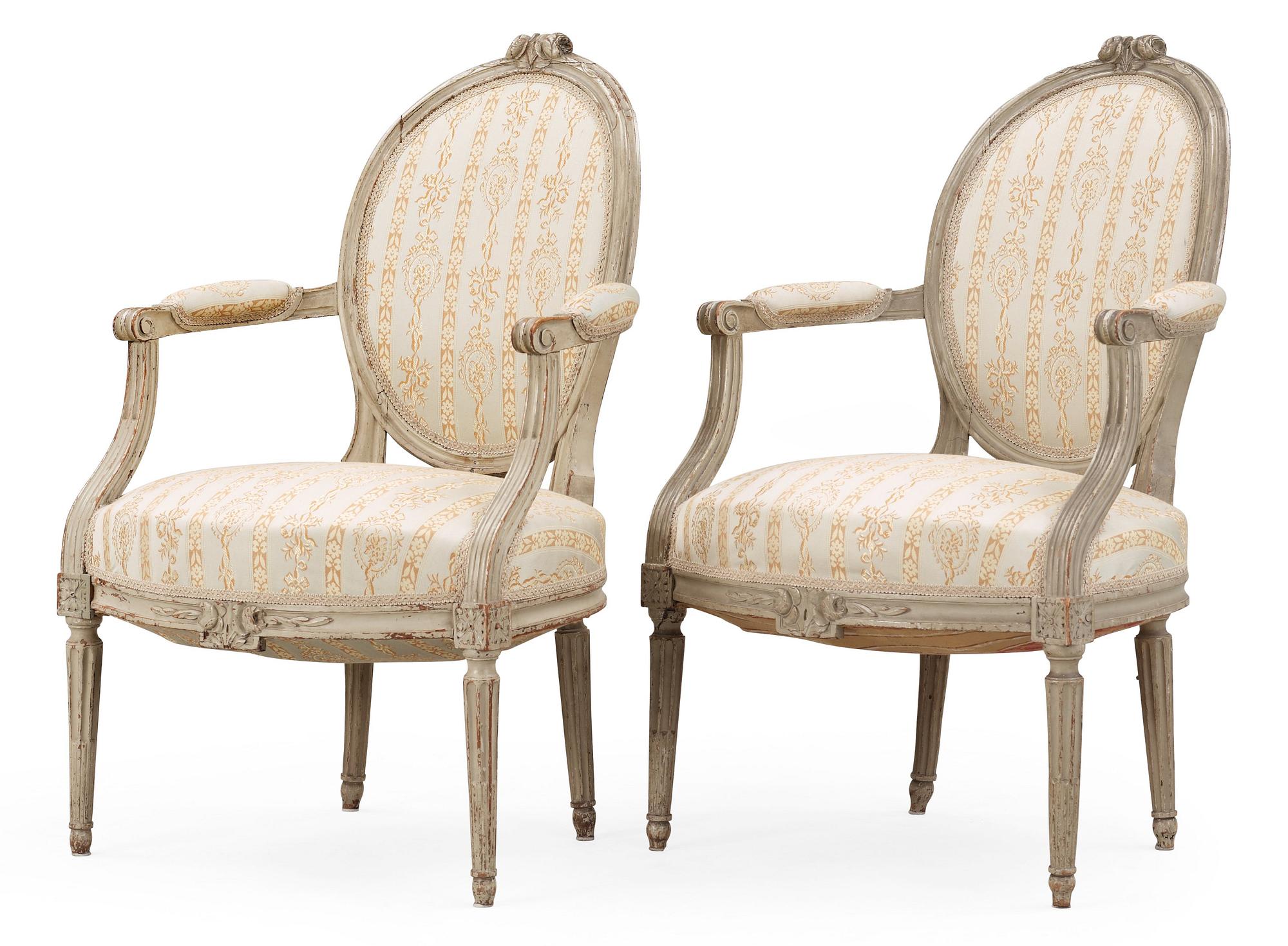 A pair of Louis XVI late 18th century armchairs.