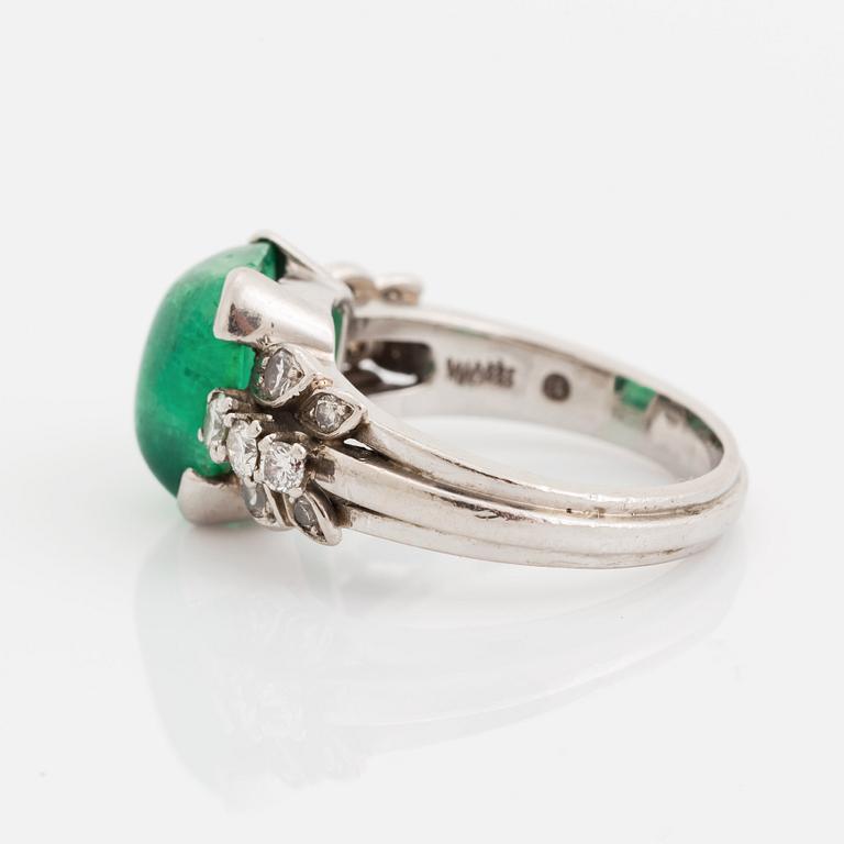 A WA Bolin 18K white gold ring set with a cabochon-cut emerald.