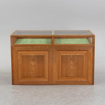 An oak shop counter.