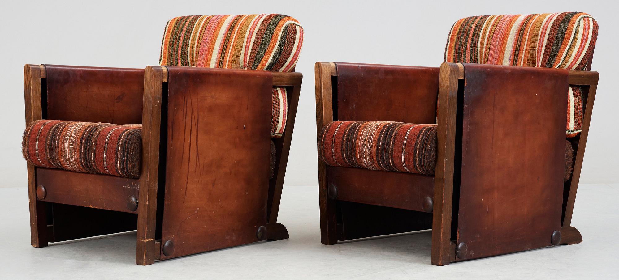 A pair of Axel Einar Hjorth brown leather 'Funkis' armchairs, Nordiska Kompaniet, Sweden ca 1930.