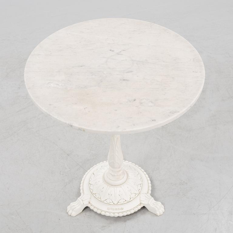 A Byarum garden table later part of the 20th century.