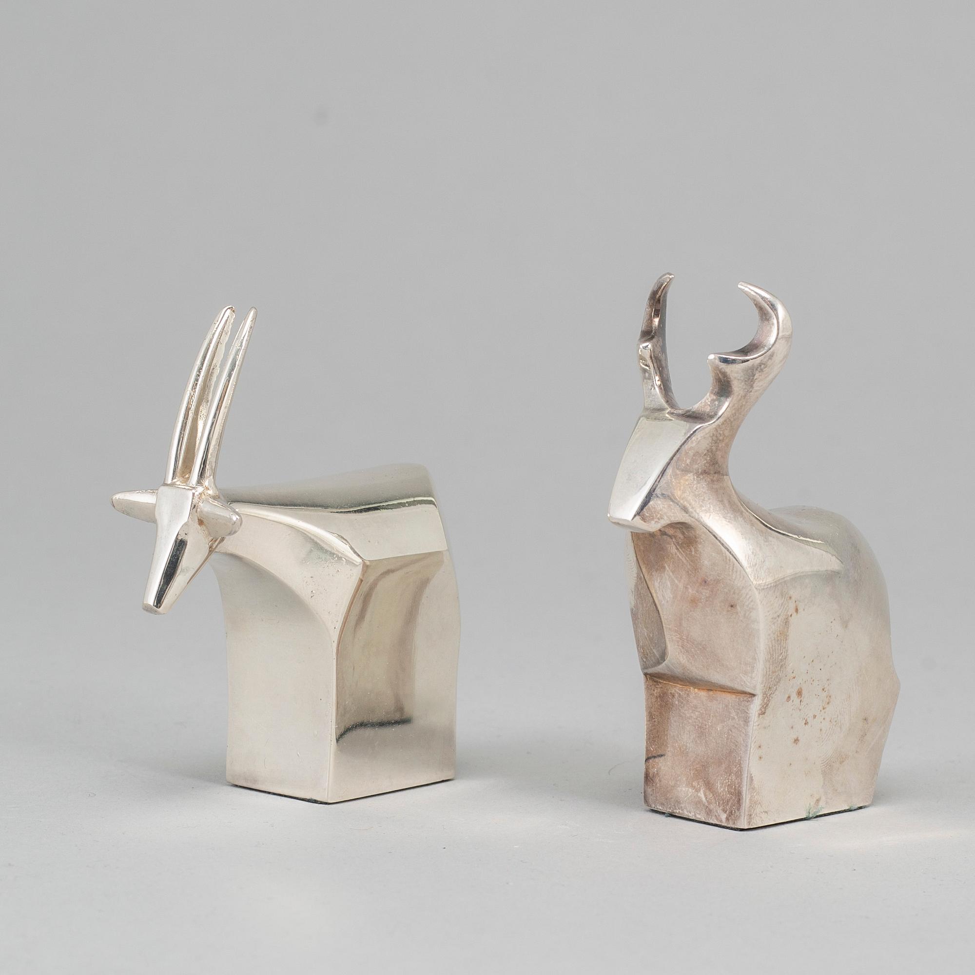 Two electro plated zinc figurines from Dansk Designs, Japan.