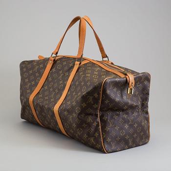 a LOUIS VUITTON "Sac Souple 55" weekend bag.