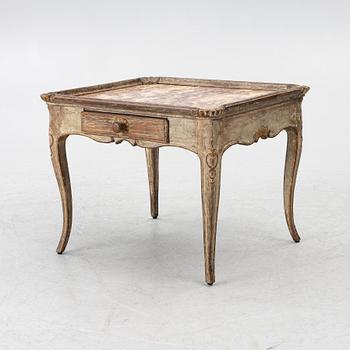 A Rococo table, 18th century.