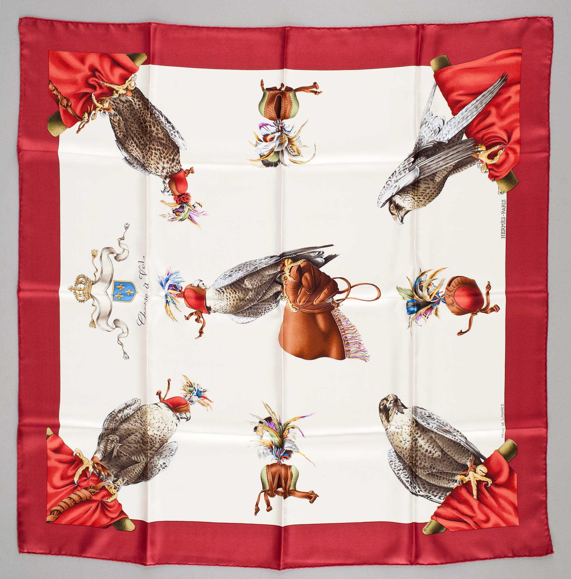 A silk scarf "Chasse a vol" by Hermès.