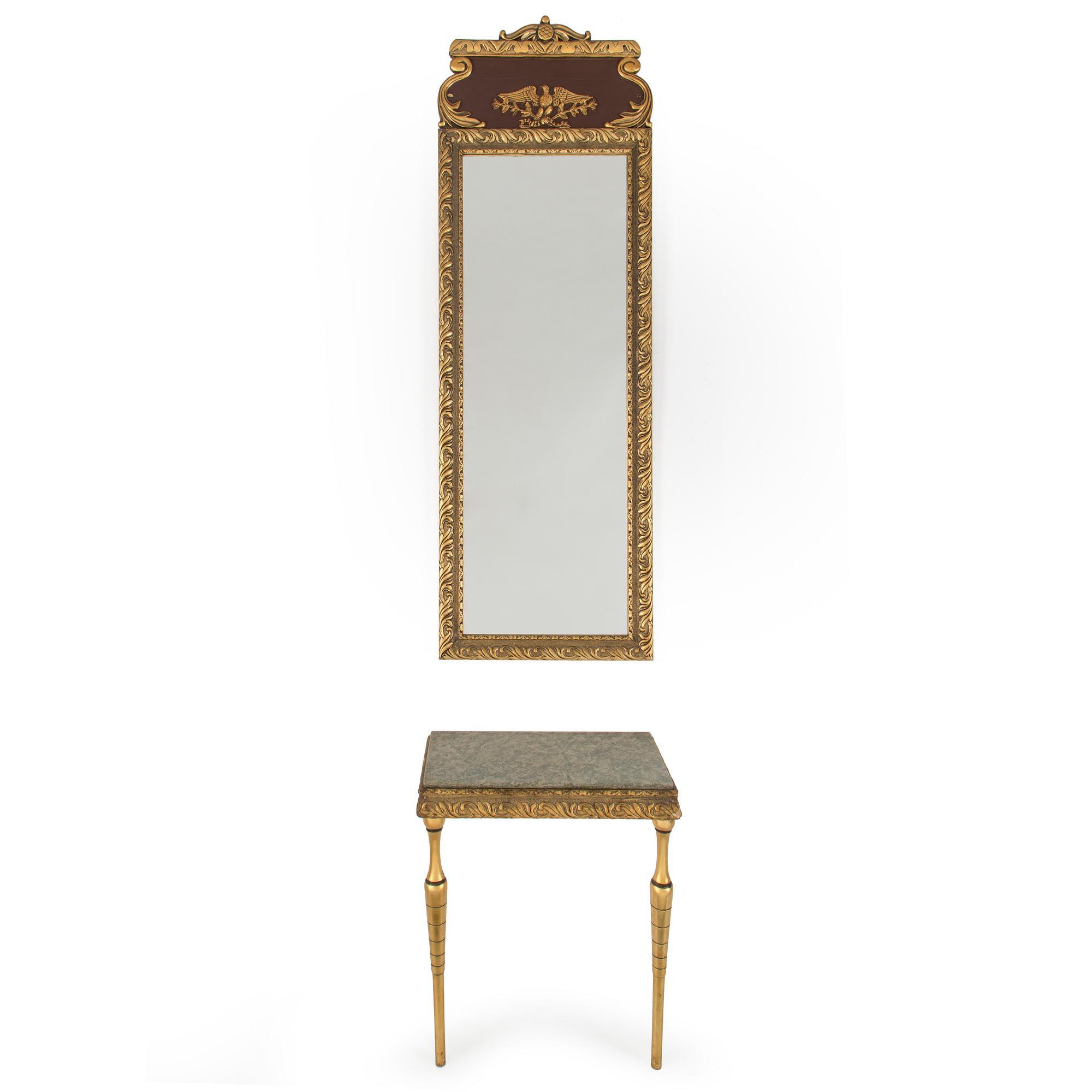 a bronzed mirror and a console table from the second half of the 20th century.