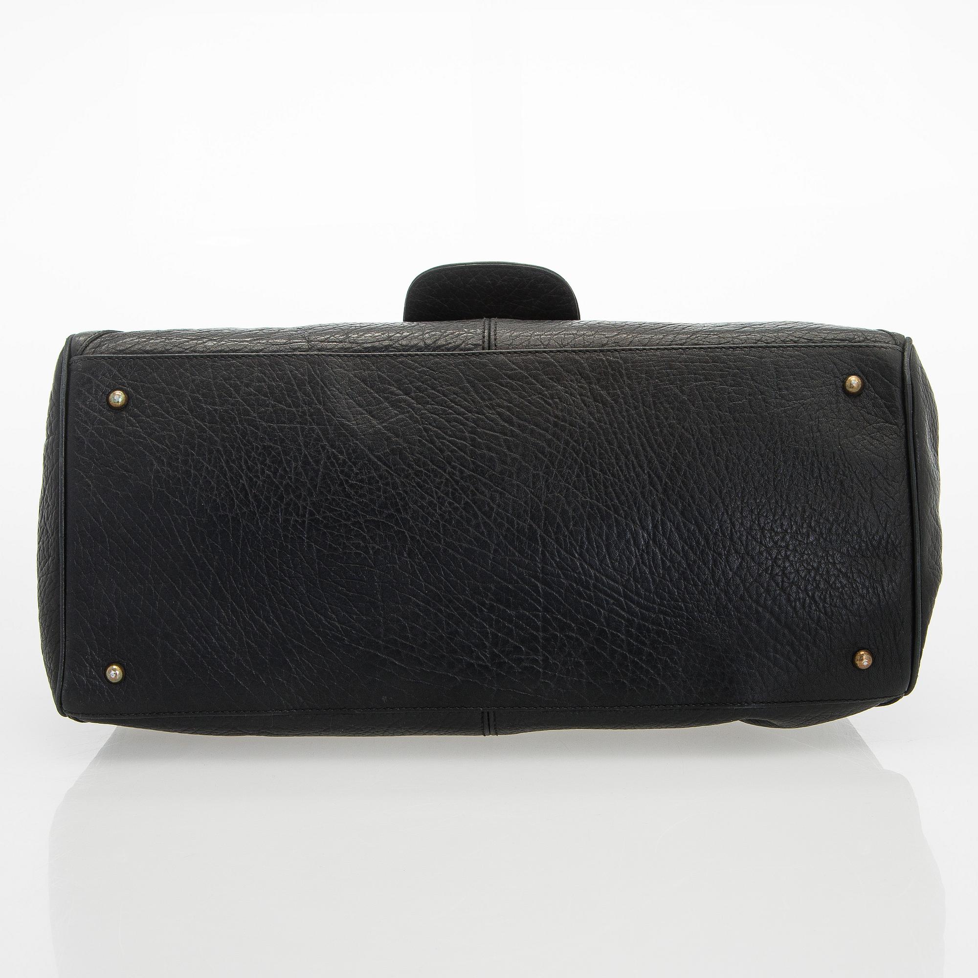 Max Mara, a leather handbag.