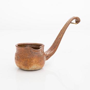 Kyllikki Salmenhaara, a stoneware, ladle, signed KS.