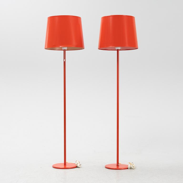 Uno & Östen Kristiansson, a matched pair of red floor lights, Luxus, Vittsjö.