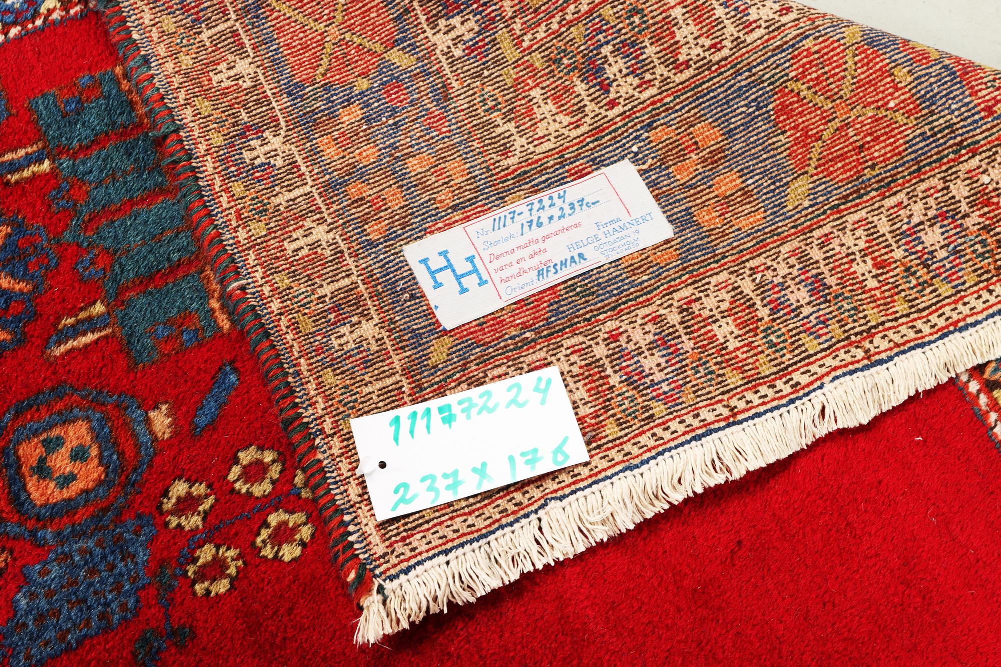 An Afshar rug, a. 237 x 176 cm.