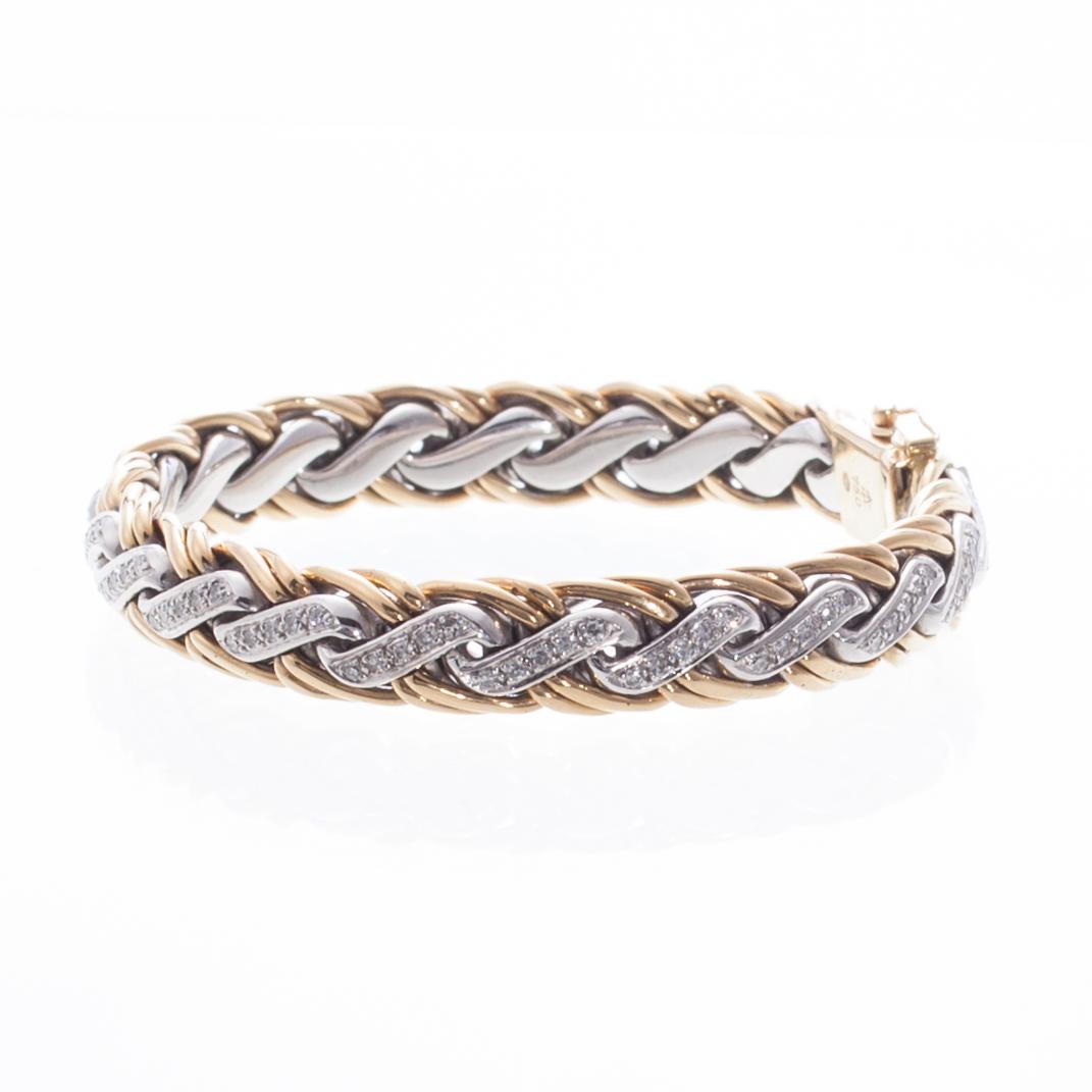 ARMBAND, 18K vitt- ovh gult guld, 8/8-slipade diamanter. Vikt ca 76,5 g.