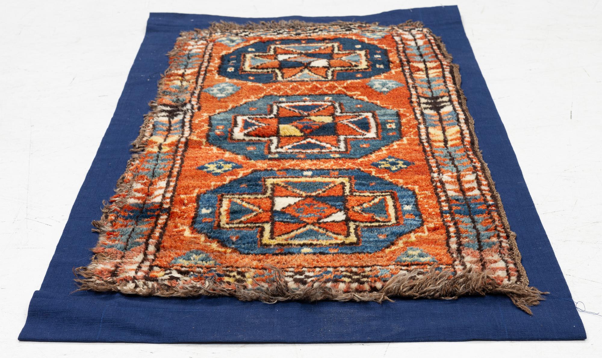 An antique Yastik rug, possibly Afghanistan, c. 110 x 57.