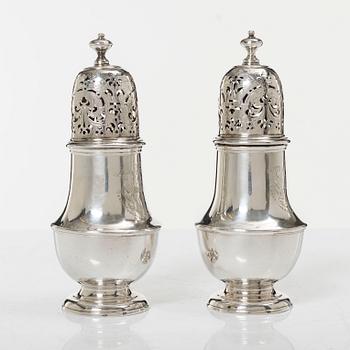A pair of Britannia standard silver sugar-casters, marks of Samuel Welder, London, 1723.