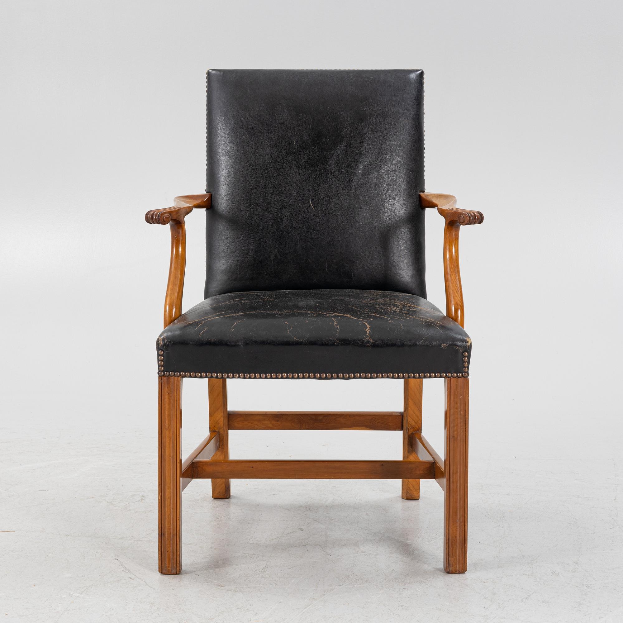 A leather upholstered armchair, 20th Century.