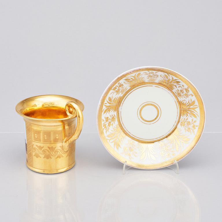 A German topographical cup with stand, 19th Century.
