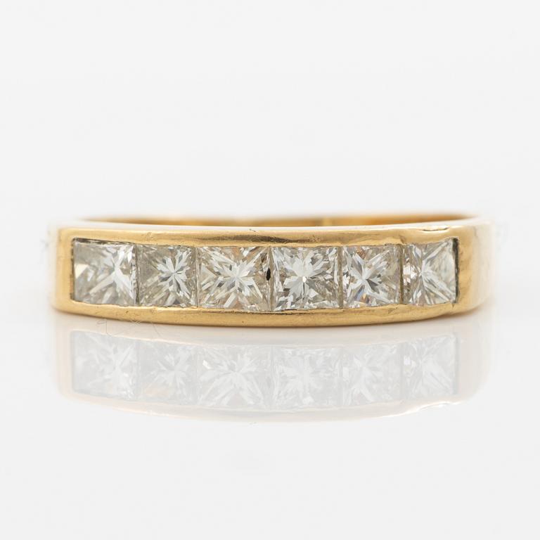 14K gold ring with princess-cut diamonds.