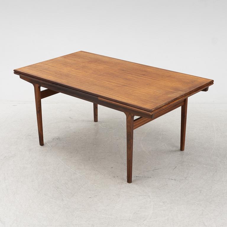Henning Kjaernulf, a rosewood-veneered dining table from Vejle stole- og Mobelfabrik, Denmark, 1960's.