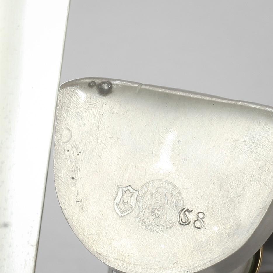 VÄGGLAMPETTER, ett par, tenn, firma Svenskt Tenn 1944.