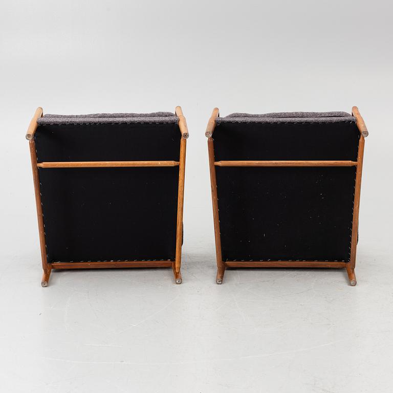 A pair of armchairs, mid-20th century.