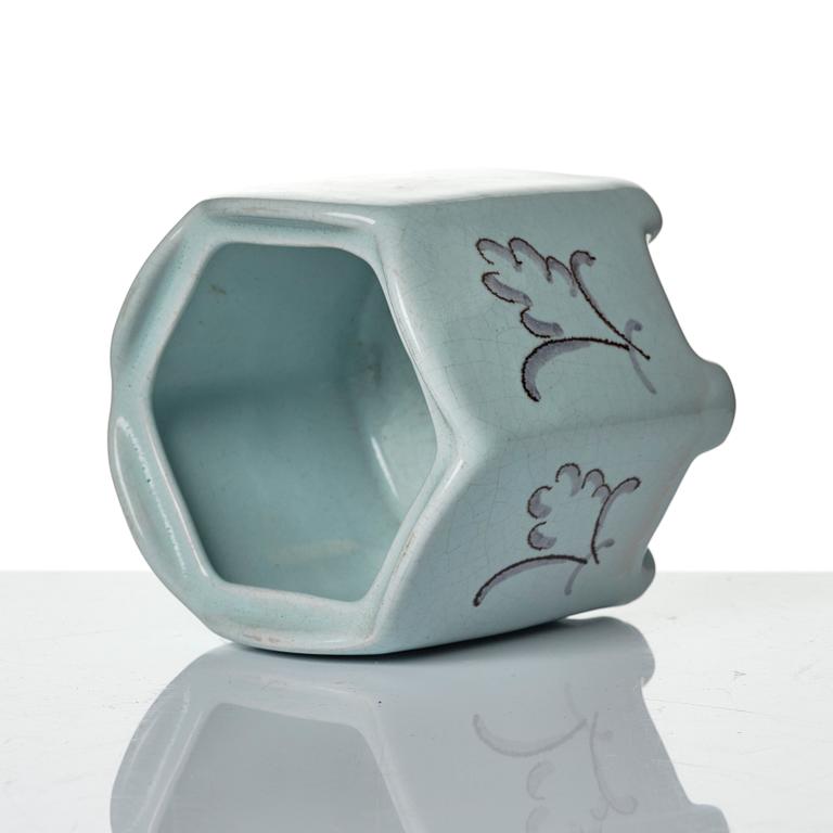 Wilhelm Kåge, eleven pieces of faience including jars, inkwells and a tulip vase, Gustavsberg, Sweden, 1919-1920.