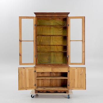 A 19th century walnut veneered  book cabinet.