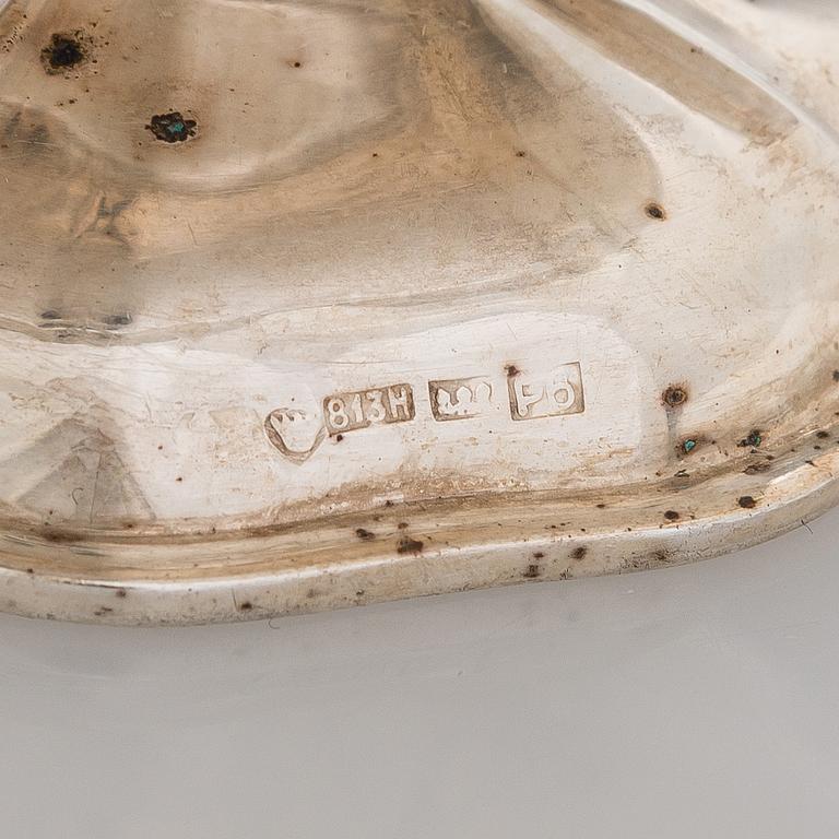 A silver coffee pot, sugar bowl, cream jug, and sugar tongs, Finland 1926-49.