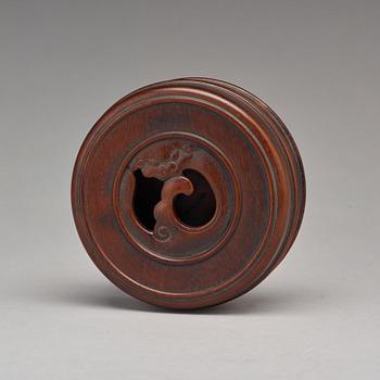 A Chinese wooden box with cover.