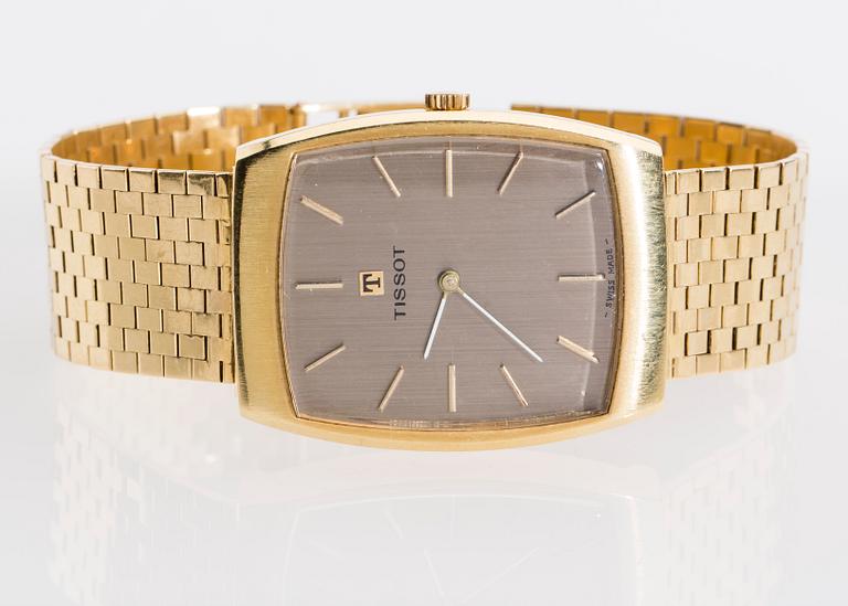 ARMBANDSUR, herr, Tissot, 18K guld. 1970-talets senare del. Vikt totalt ca 71 gram.