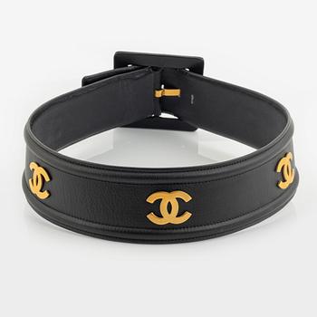 Chanel, a black leather and gold tone metal belt.