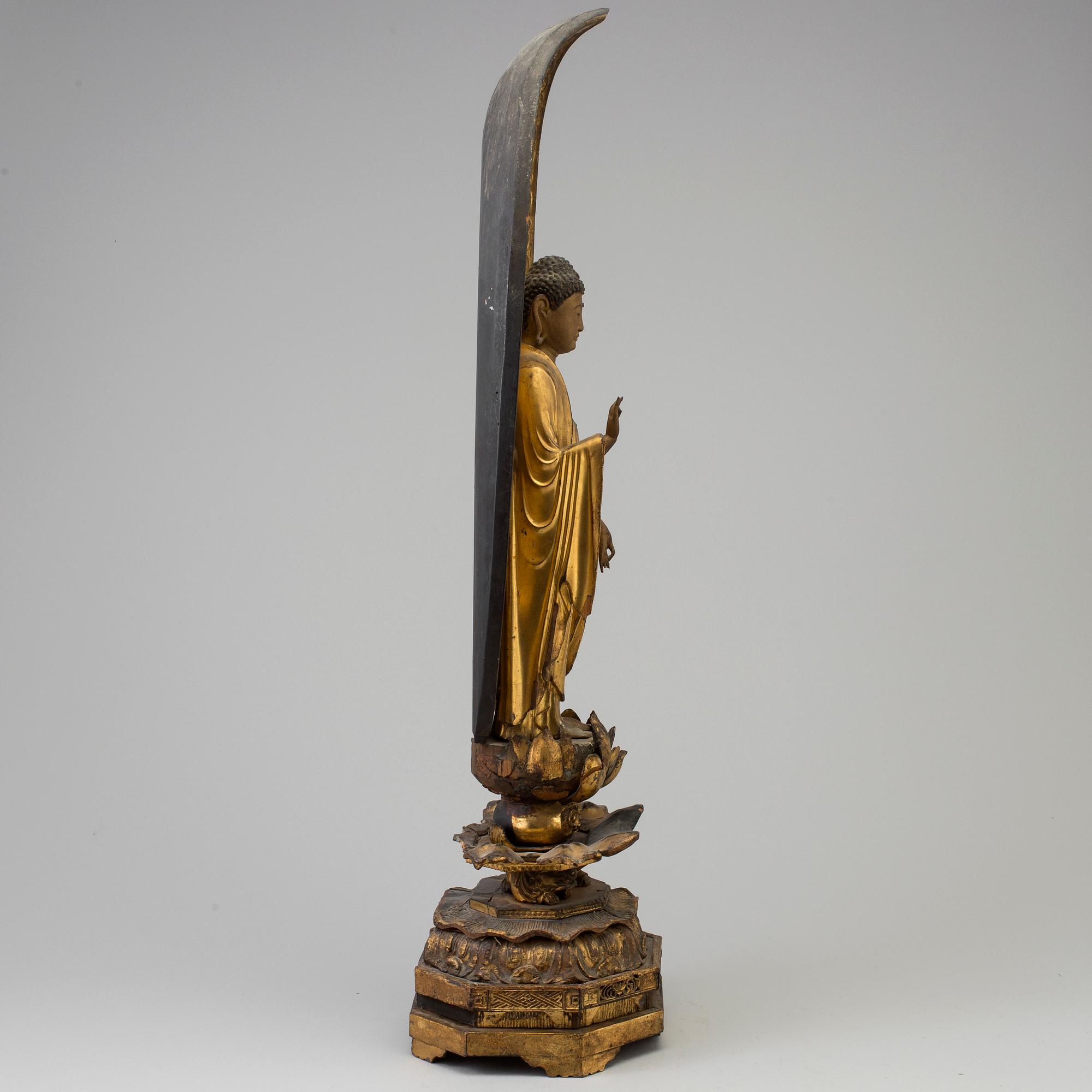 A large wooden lacquered figure of buddha, Japan, 19th Century.