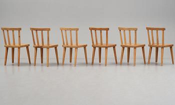 Axel Einar Hjorth, a set of six "Utö" stained pine chairs, Nordiska Kompaniet, Sweden 1930's.