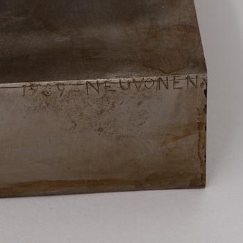 A bronze sculpture signed and dated 1969.