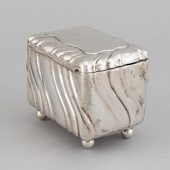 A 20th century parcel-gilt silver sugar-box, Swedish import marks from 1919.