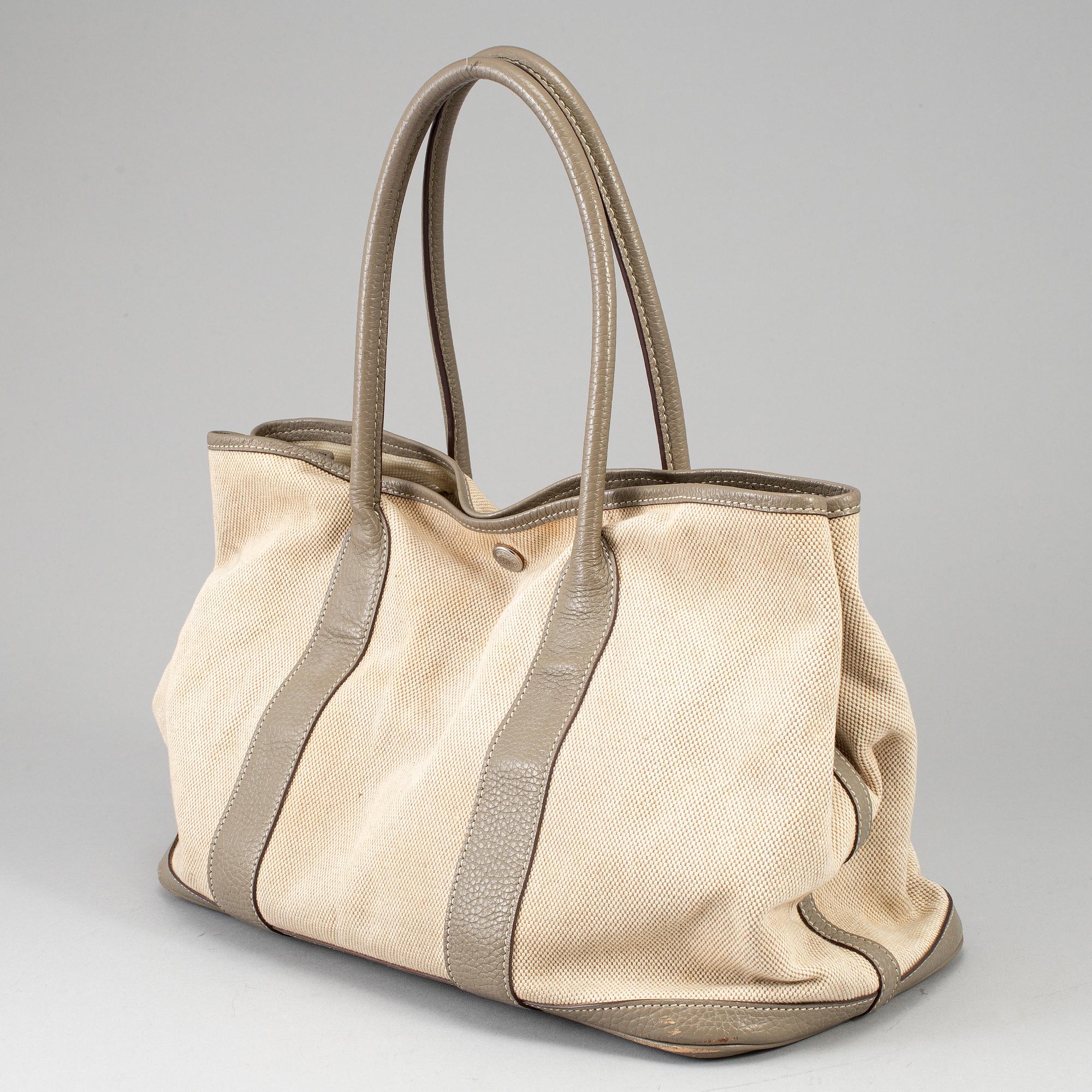 HERMÈS, a canvas and leather 'Garden Party' bag.