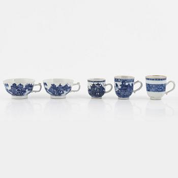 A group of thirteen cups, a bowl and a cup holder, four saucers, partly China and 18th century,