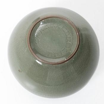 A Korean celadon glazed ceramic vase, 1900s.