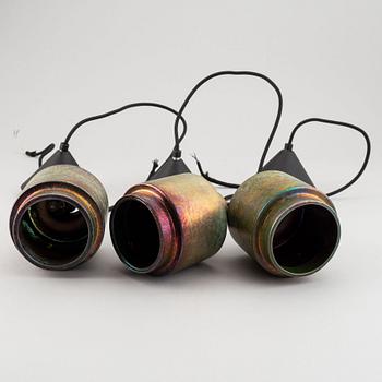 Tom Dixon, a set of three stoneware “Lustre pendants”.