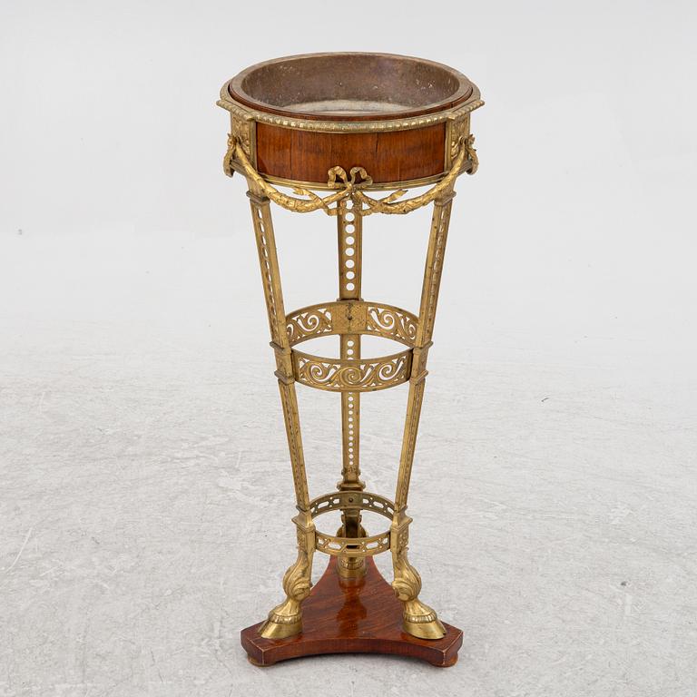 An Empire style flower table, circa 1900.