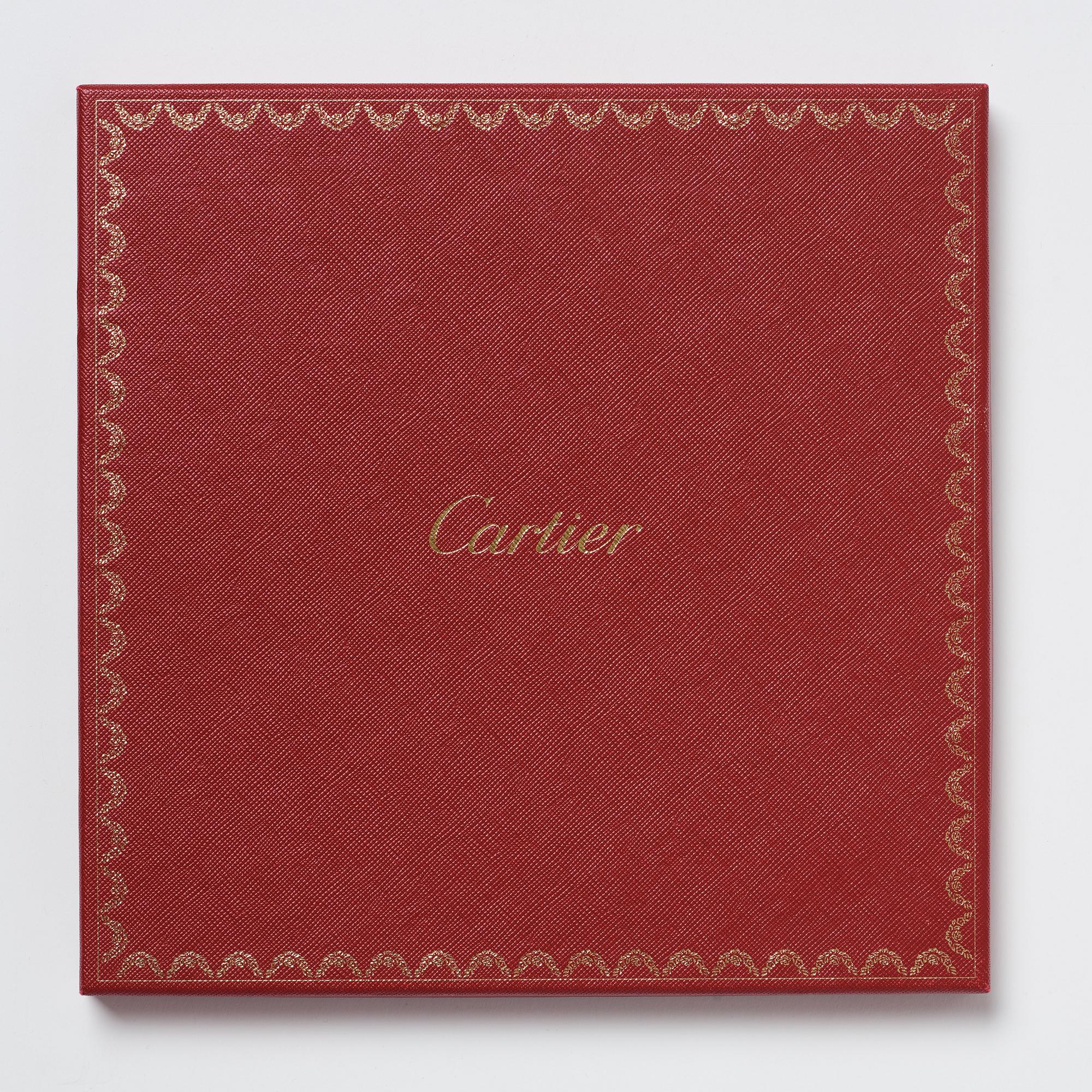Cartier, a 'Le temps Précieux' twill silk scarf.