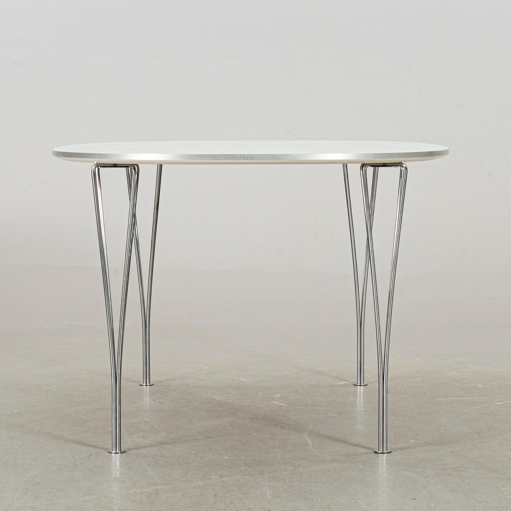 A BRUNO MATHSSON & PIET HEIN "SUPERELLIPS" TABLE, Fritz Hansen, Denmark 2007.