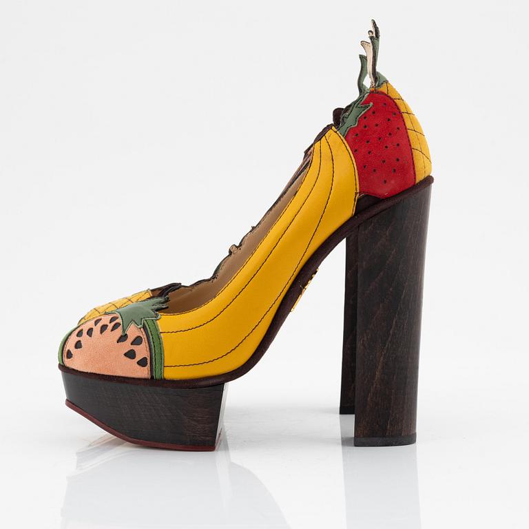 Charlotte Olympia, a pair of leather, suede and wood pumps, size 36.